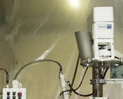 <Intermittent Motion Poucher>