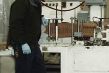 <Intermittent Motion Poucher>