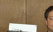 <John Uske with a liquid level controller he made>