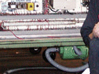 <John Uske with new electric system he built>