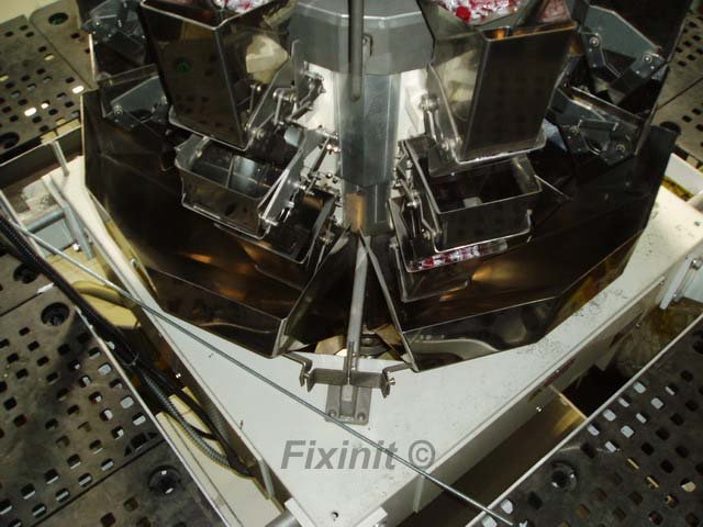 <Bagging Machine repaired by John Uske>