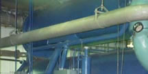 <Absorption chiller being repaired>